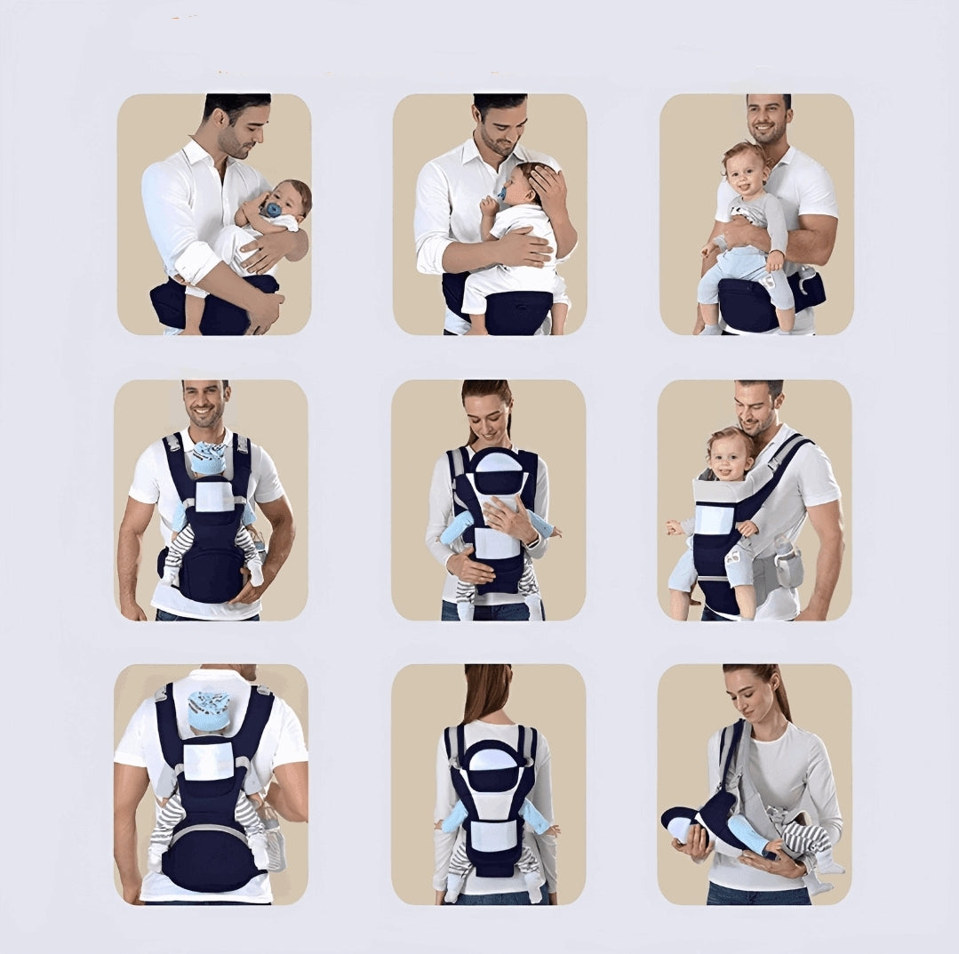 baby in a baby carrier with a man standing - un homme porte son bébé avec un porte-bébé bleu marine